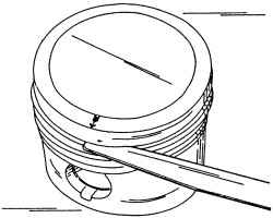 Измерение зазора между поршневыми кольцами и кольцевыми канавками в головке поршня