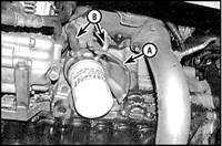  Масляный радиатор двигателя (6-цилиндровые модели) Mazda 626