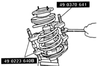  Разборка амортизационной стойки/снятие и установка амортизатора/винтовой пружины Mazda 323