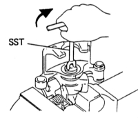   Снятие и установка колодок заднего дискового тормоза Mazda 323