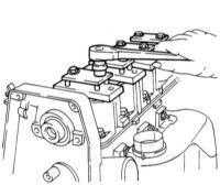  Снятие, проверка состояния и установка распределительного вала с корпусом газораспределительного механизма Opel Corsa