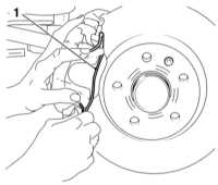  Замена колодок дисковых тормозных механизмов передних колес Opel Astra