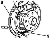  Замена башмаков барабанных тормозных механизмов задних колес Opel Astra