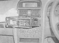  Снятие и установка аудиосистемы/ навигационного блока Opel Astra